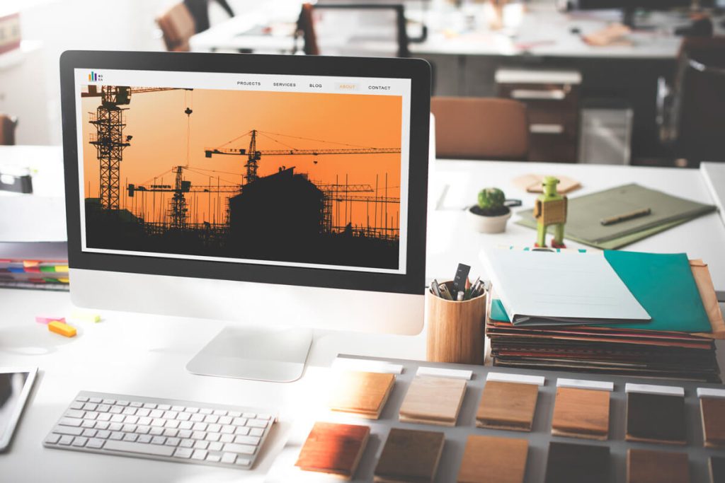 o-que-ter-em-um-site-industrial-capa-weein-agencia-de-criacao-de-sites-ot Tela de computador com exemplo de site industrial